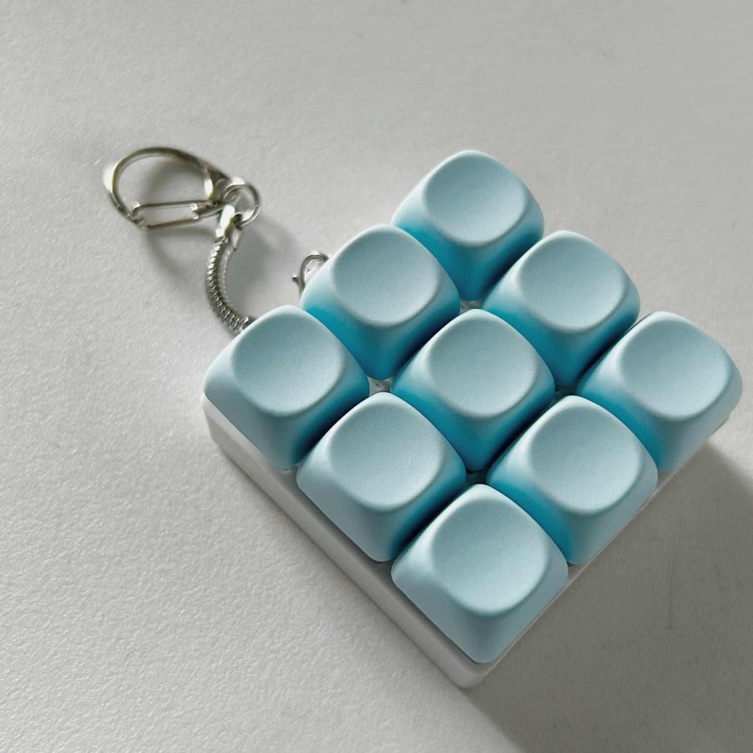 2-Pack Light Blue Mechanical 9-Keyboard Fingertip Toy Keychain - Key