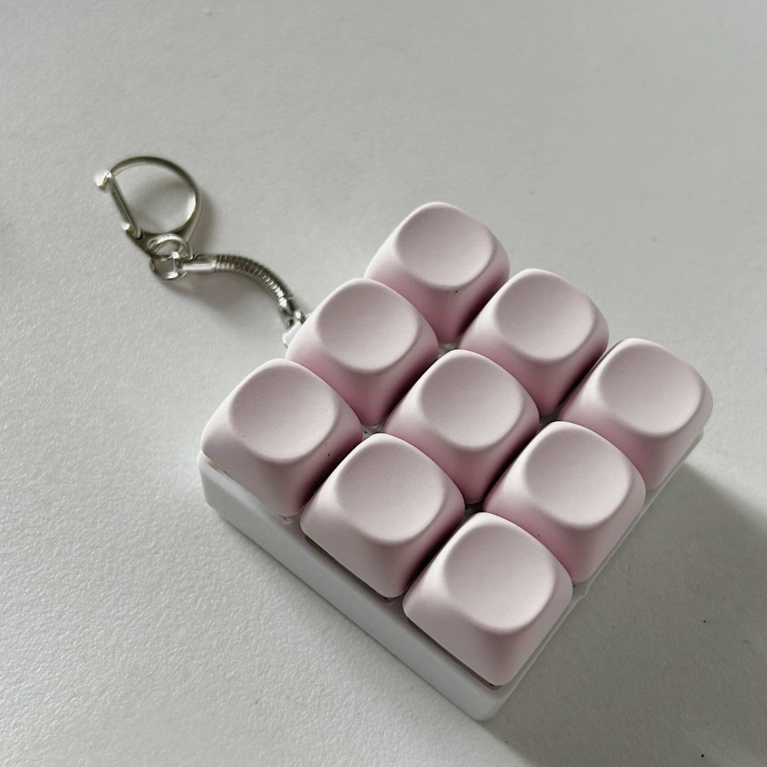 2-Pack Light Pink Mechanical 9-Keyboard Fingertip Toy Keychain - Key