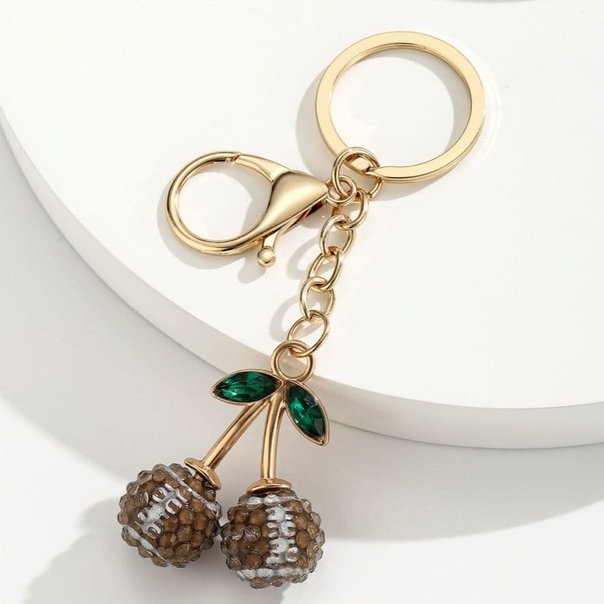 2-Piece Brown rugby ball shape Creative Sports Ball Cherry Keychain - Resin