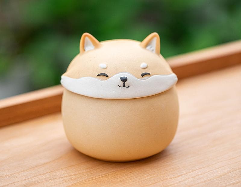 Artisan Ceramic Sealed Storage Jar with Animal Design - Light yellow