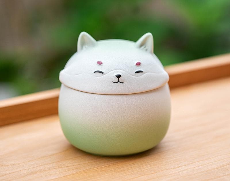 Artisan Ceramic Sealed Storage Jar with Animal Design - Light green