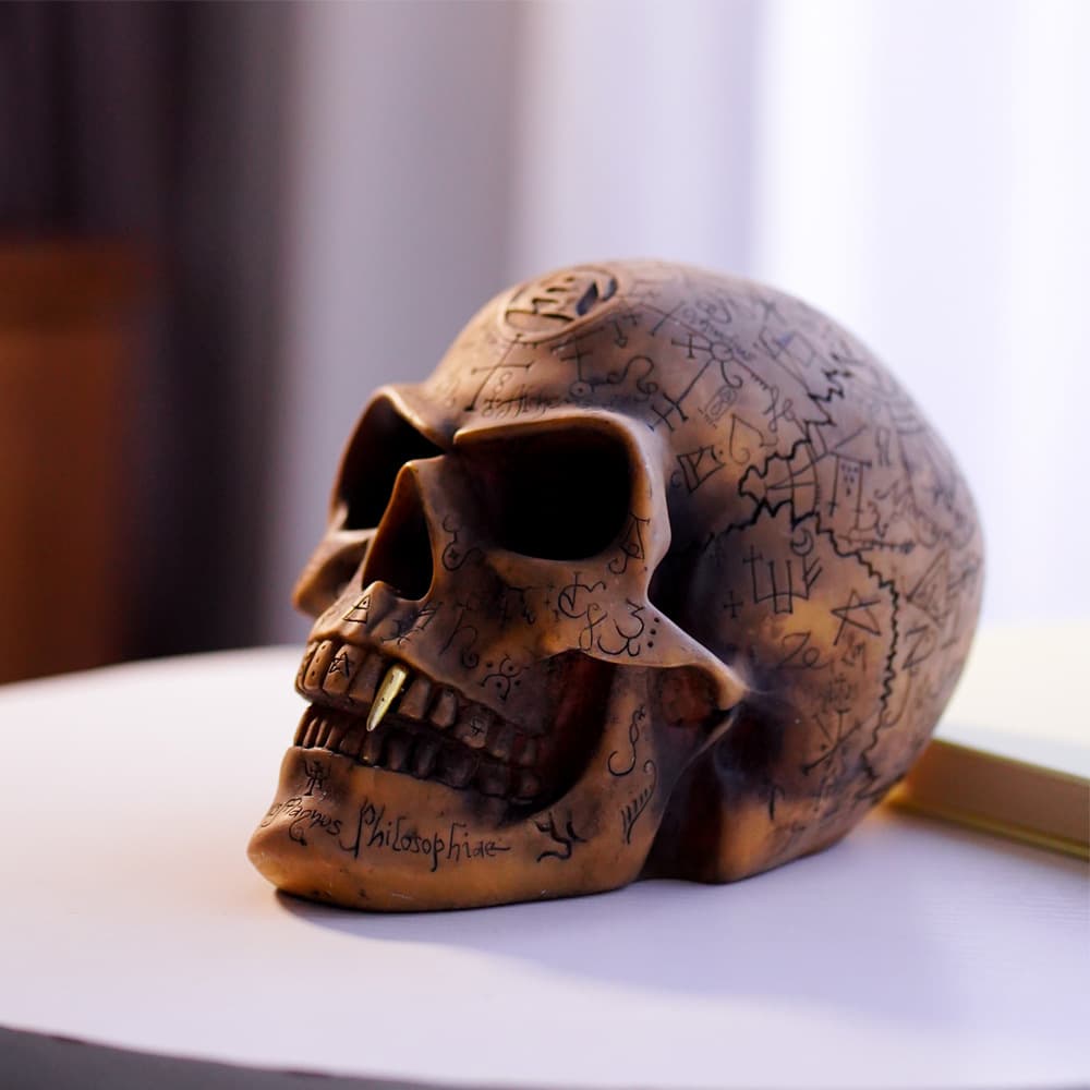 Mystic Runic Skull Statue with Gold Fang - Hand-Painted Resin Figurine
