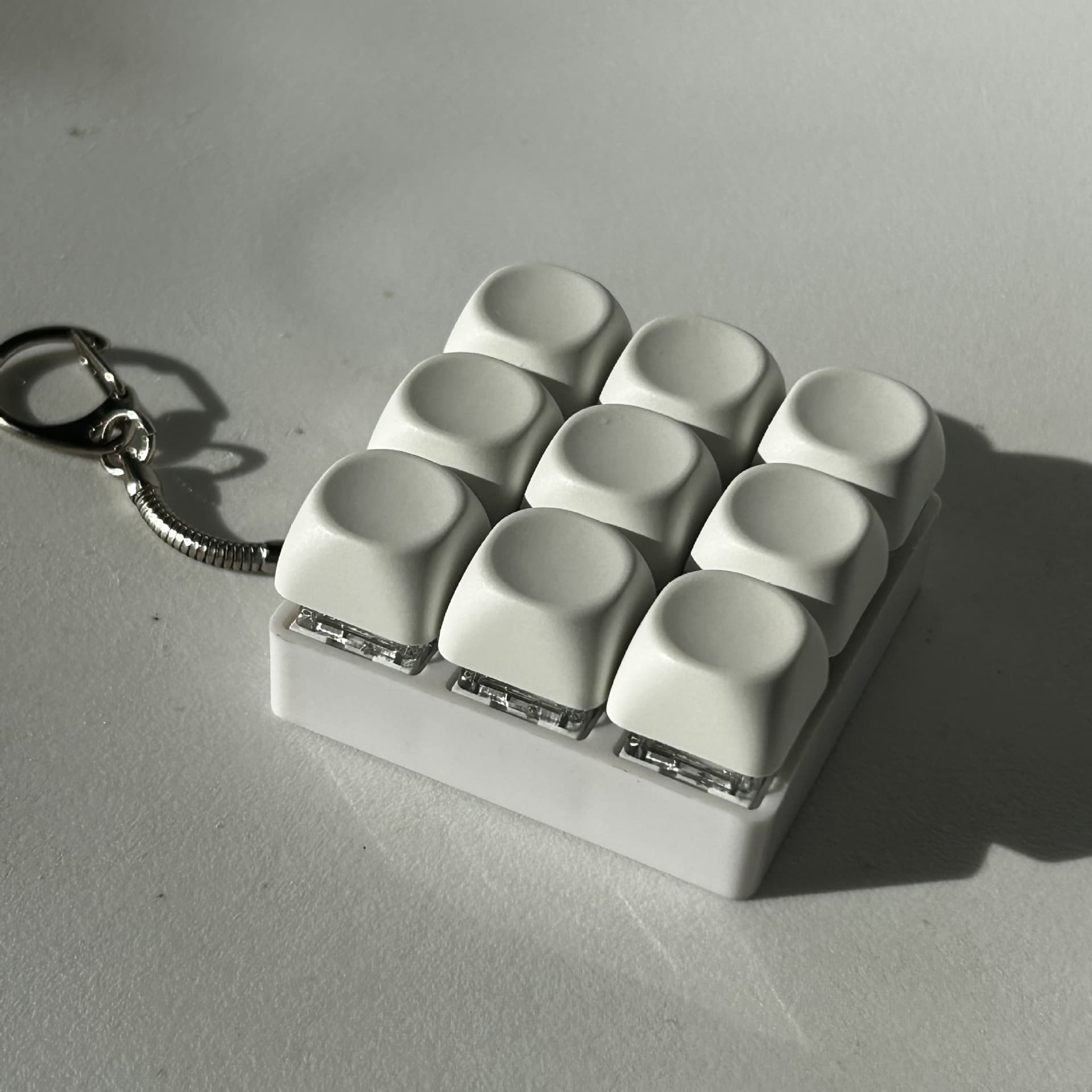 2-Pack White Mechanical 9-Keyboard Fingertip Toy Keychain - Key Pressure