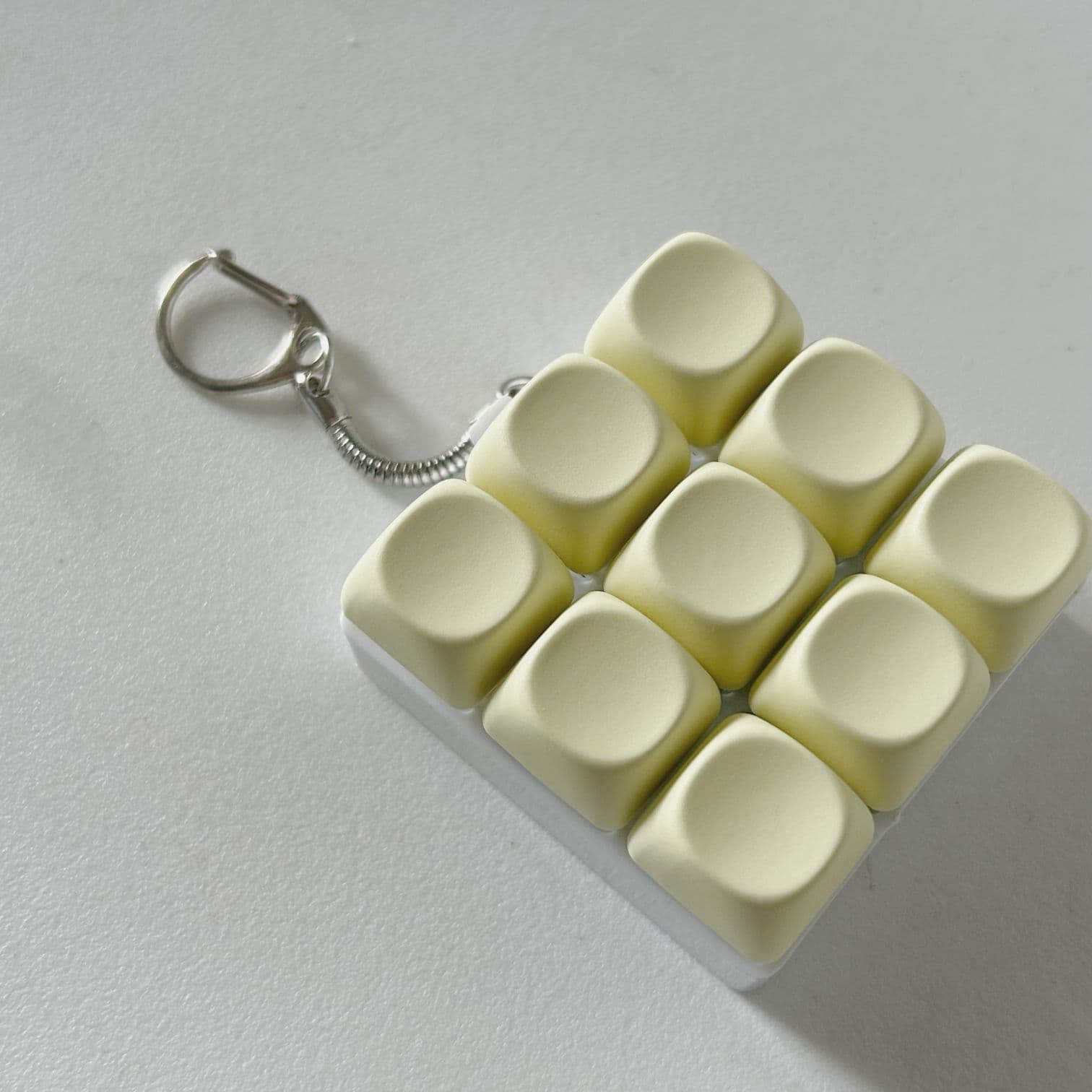 2-Pack Light Yellow Mechanical 9-Keyboard Fingertip Toy Keychain - Key